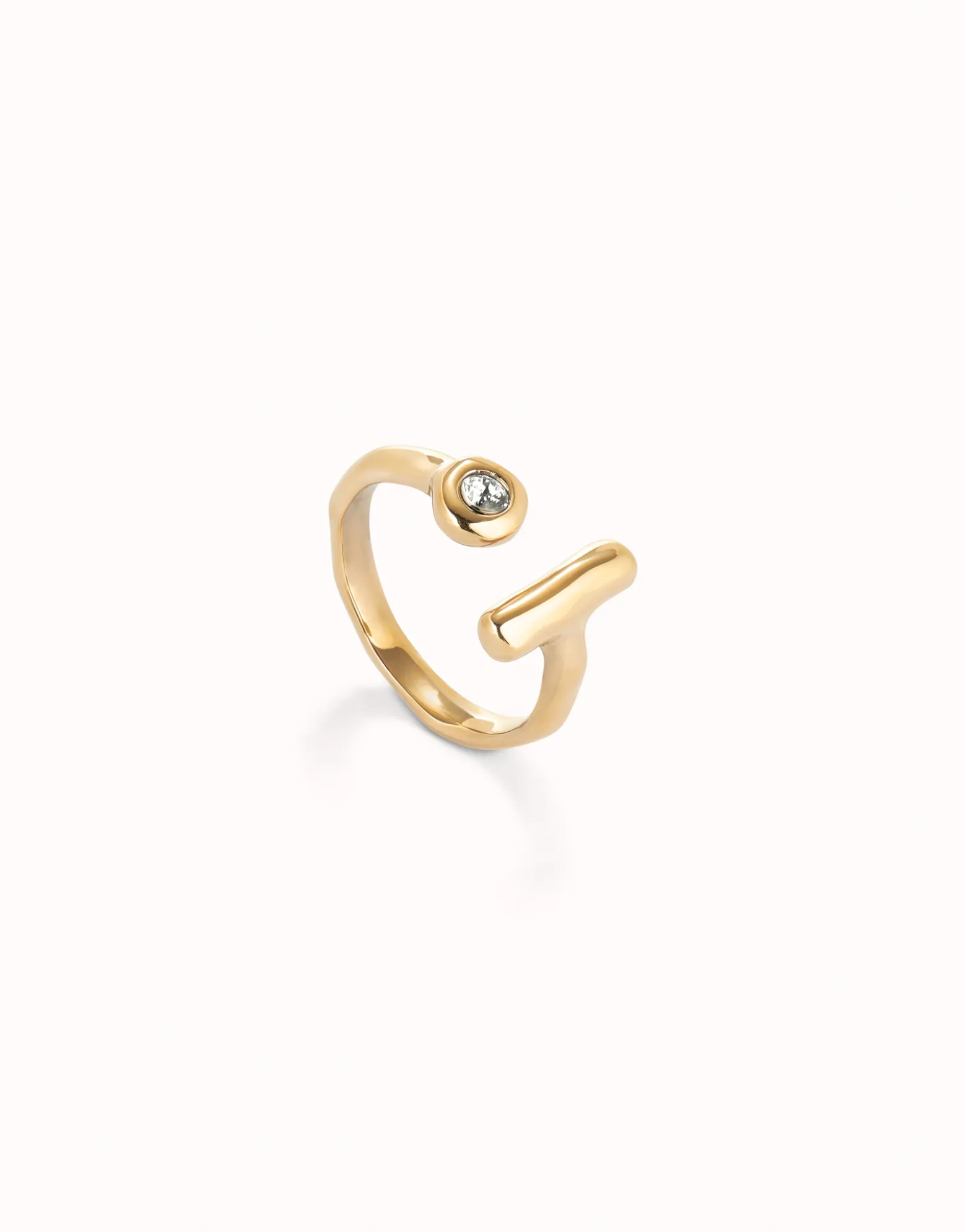 Anillo abierto bañado en oro 18k con topacio blanco