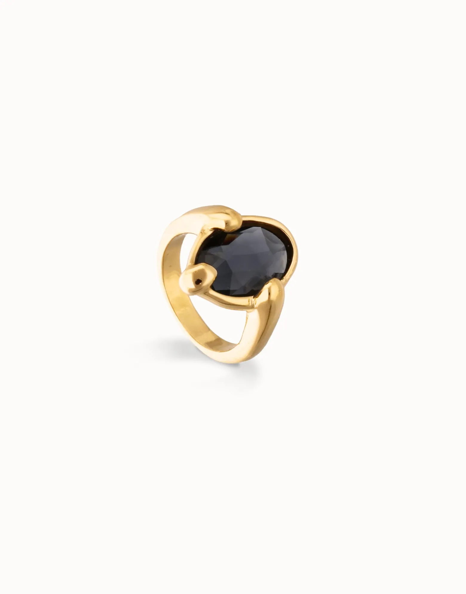 Anillo bañado en oro 18k con cristal facetado ovalado negro