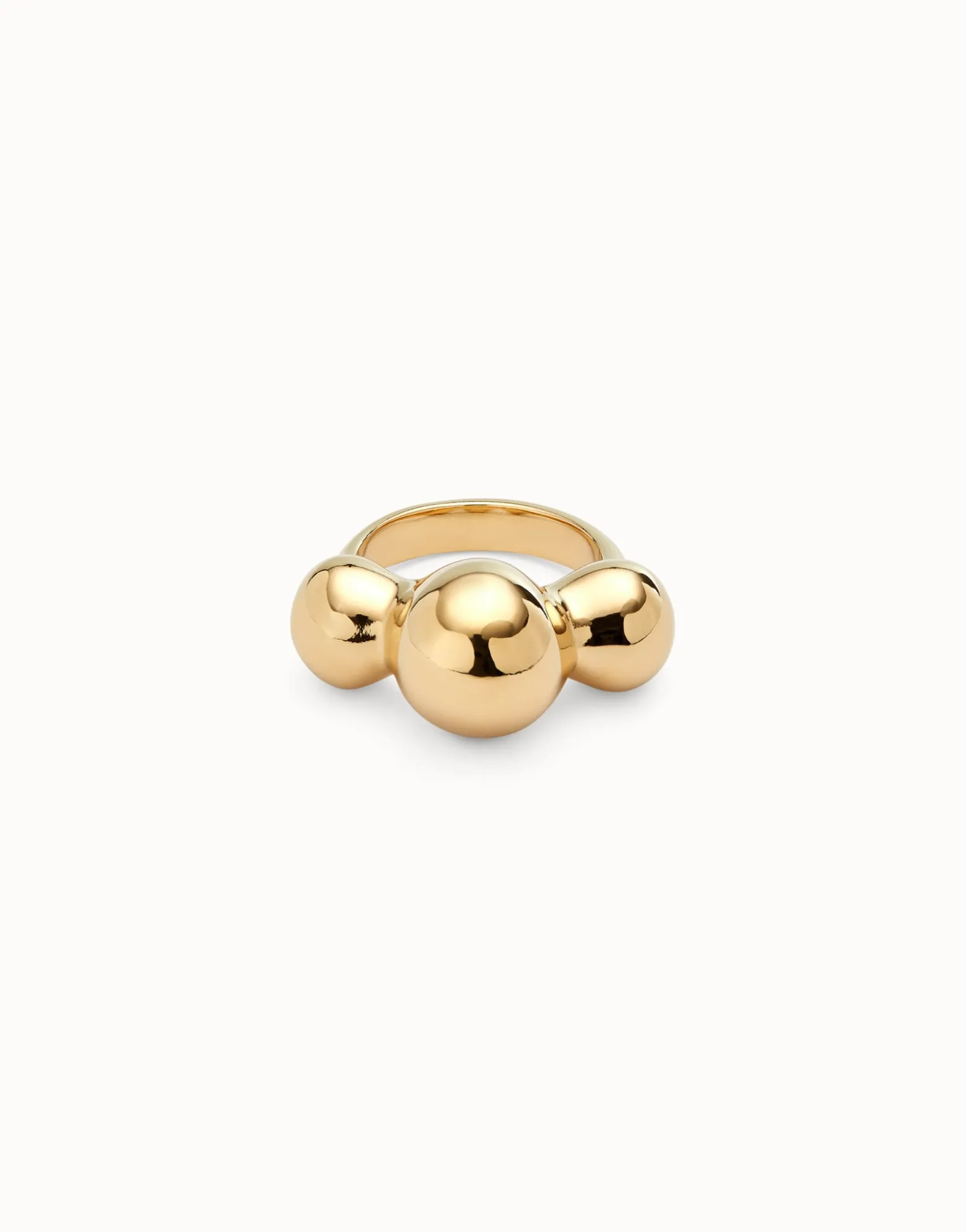 Anillo bañado en oro 18k y tres bolas centrales