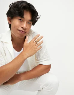Anillo bañado en oro 18k y tres bolas centrales