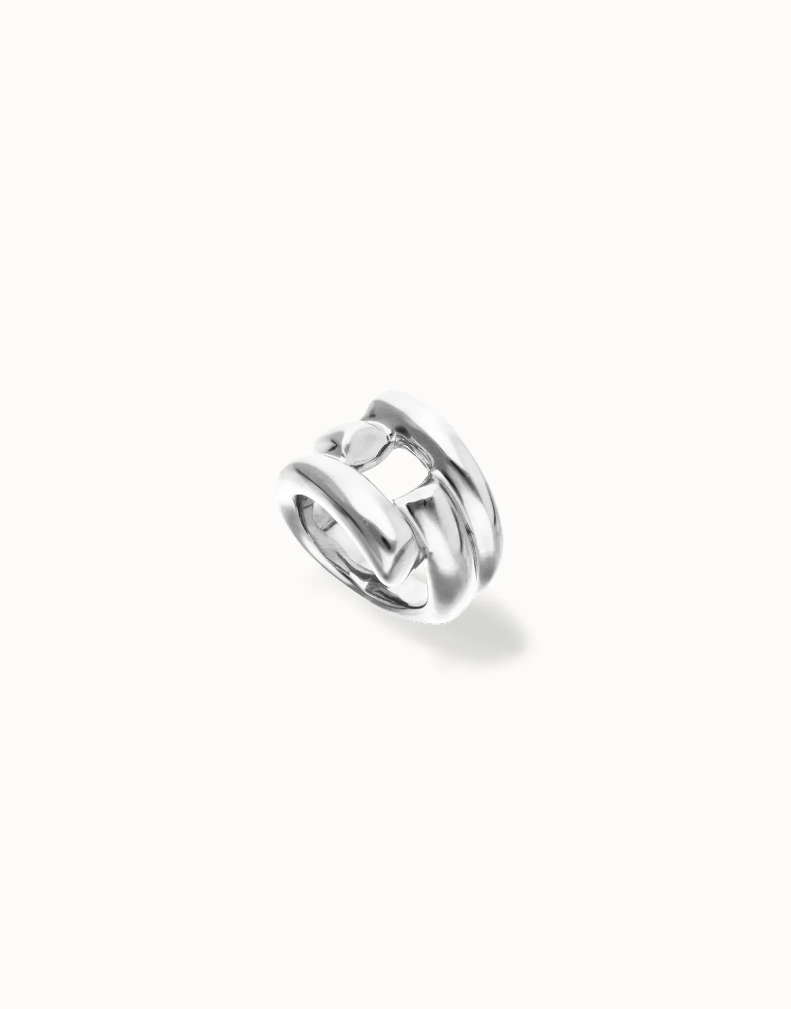 Anillo bañado en plata con 4 formas orgánicas entrelazadas