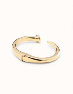 Brazalete con forma de clavo bañado en oro de 18k