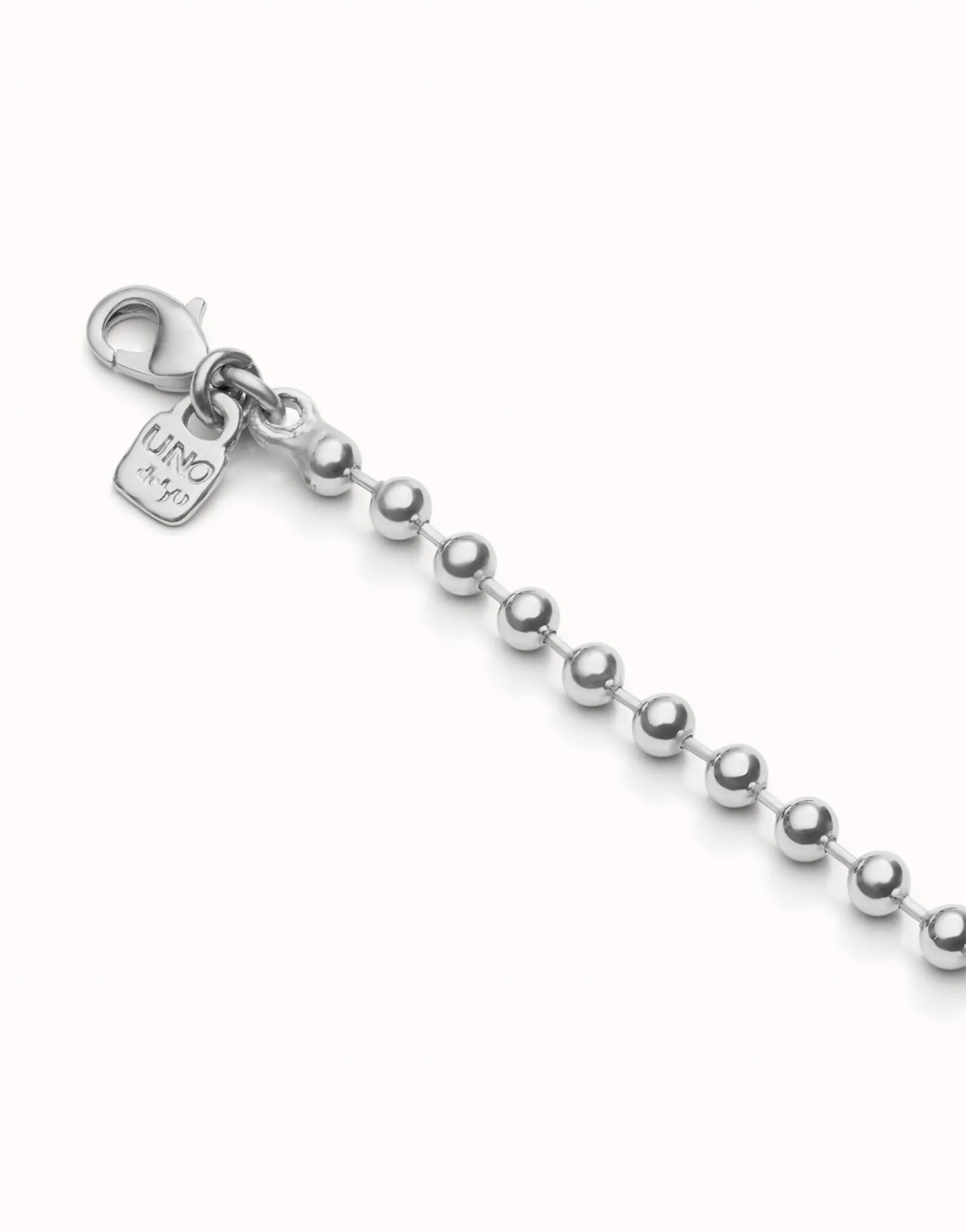 Cadena larga bolas bañada en plata de ley.
