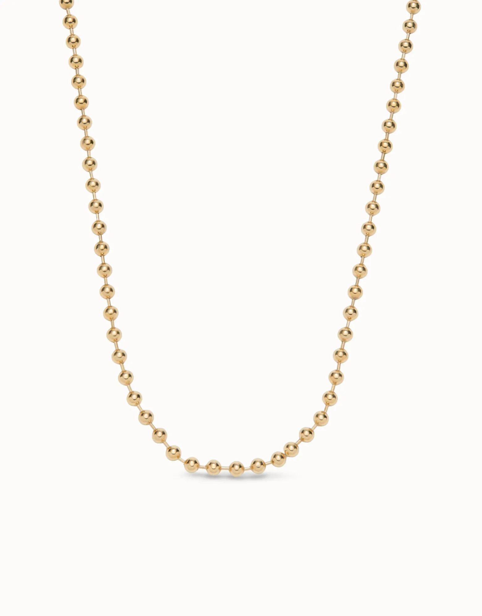Cadena larga de bolas bañada en oro 18k.