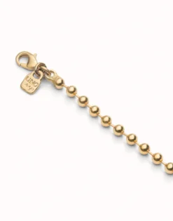 Cadena larga de bolas bañada en oro 18k.