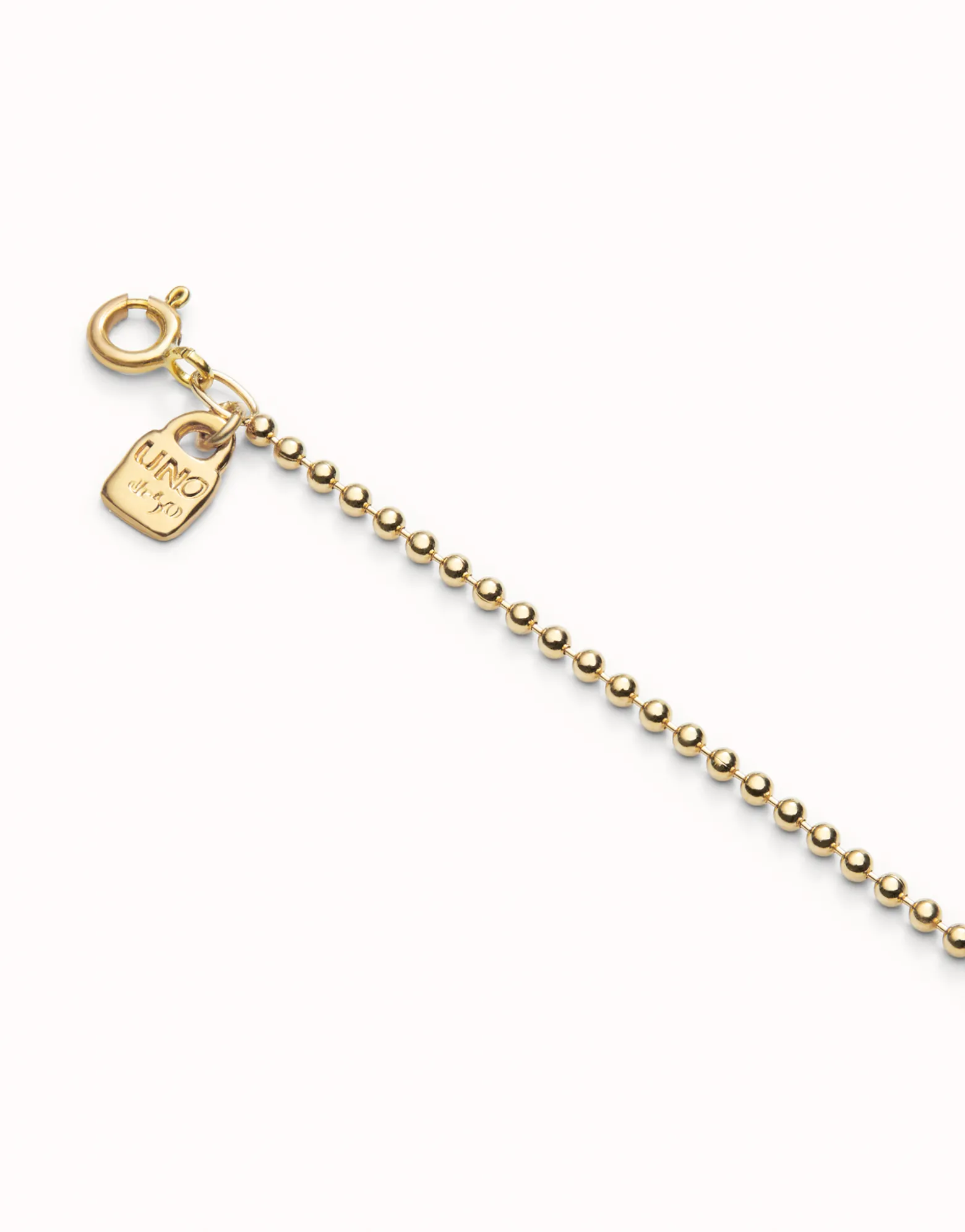 Cadena media con bolas bañada en oro 18k