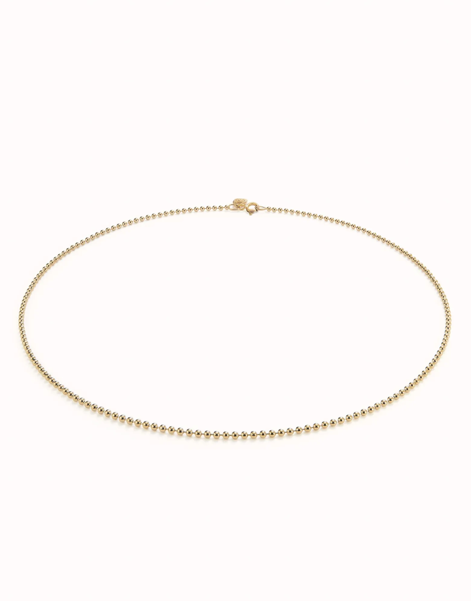 Cadena media con bolas bañada en oro 18k