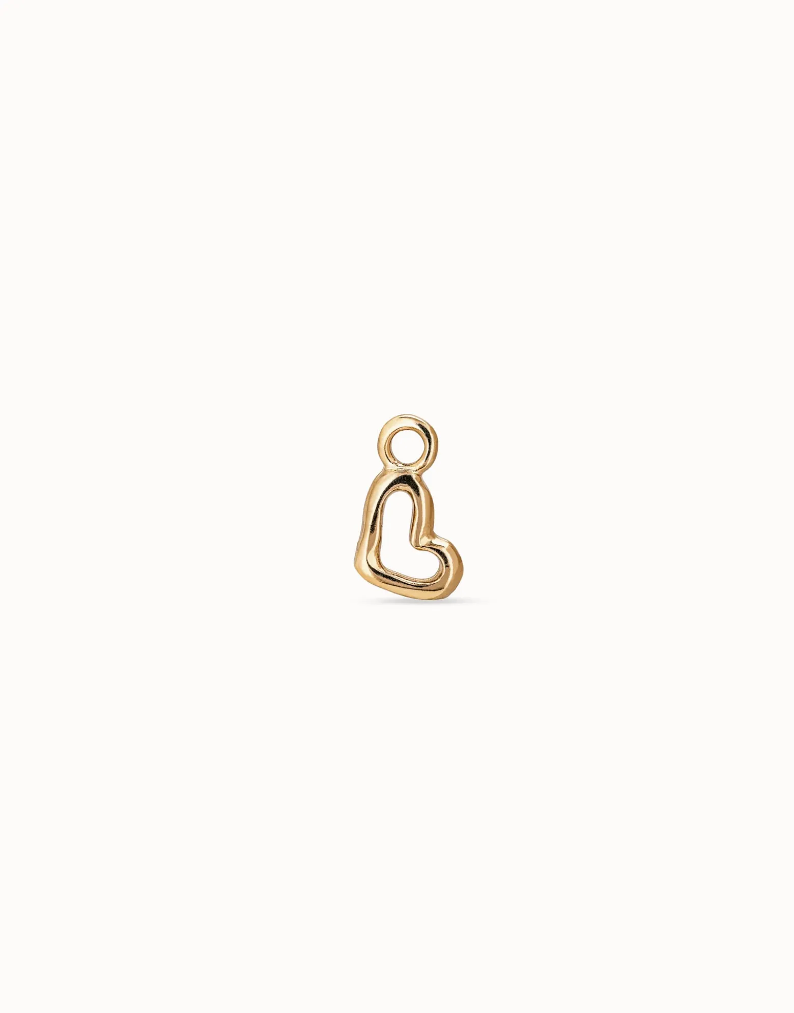 Charm Piercing corazon hueco bañado en oro mujer