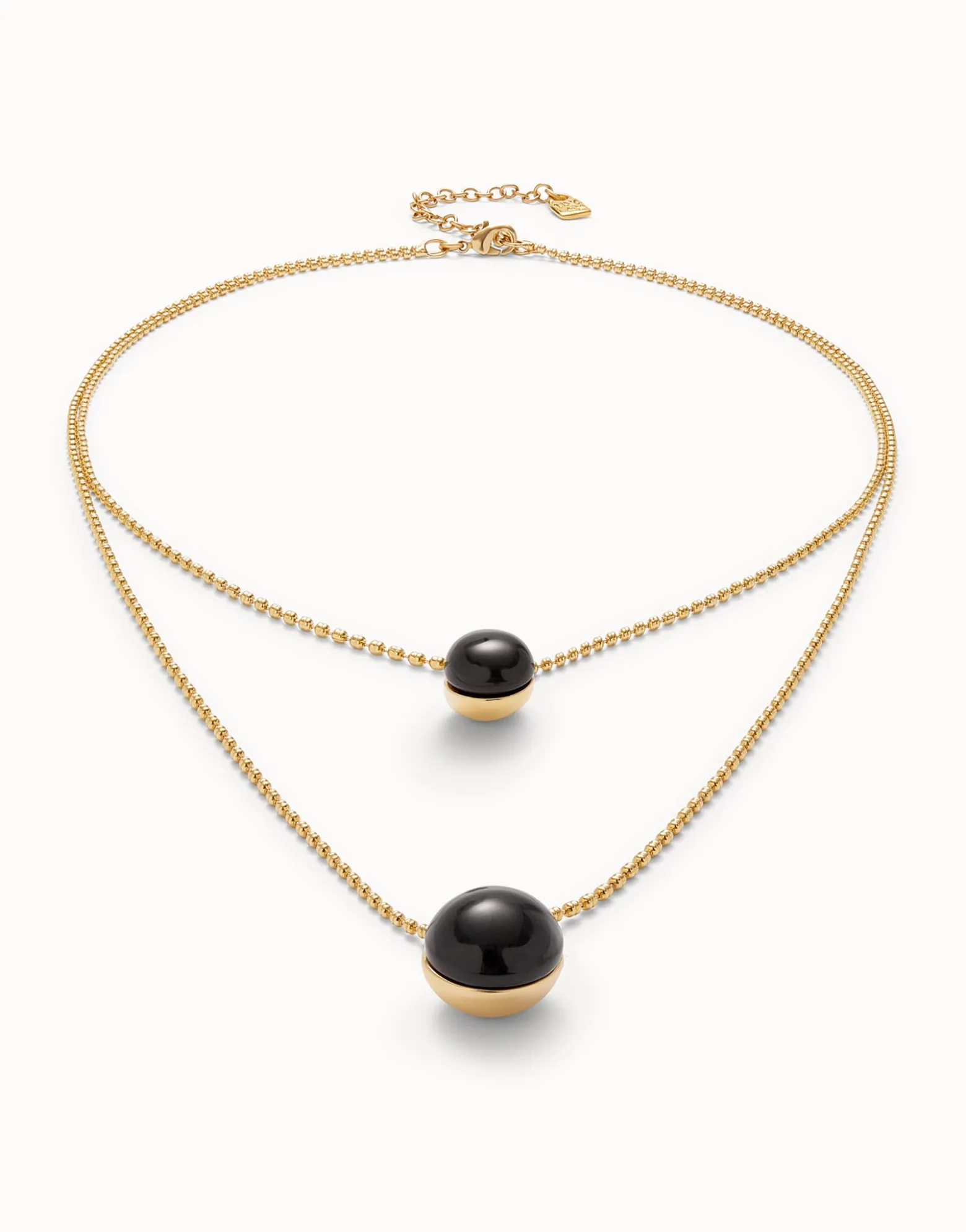 Colgante bañado en oro 18k con doble cadena y cristales centrales de murano