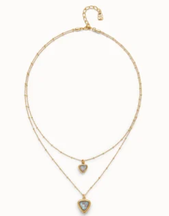 Colgante bañado en oro 18k con doble cadena y triángulo de cristal