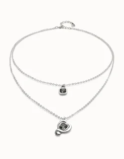 Colgante bañado en plata de ley con doble cadena y corazones con cristal negro