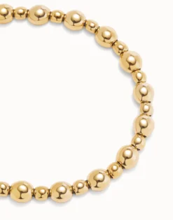 Colgante de bolas en dos tamaños bañado en oro 18k