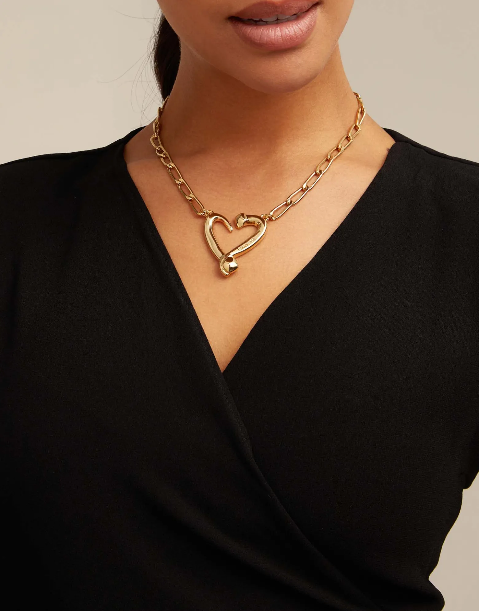 Colgante de oro 18k de eslabones y corazón