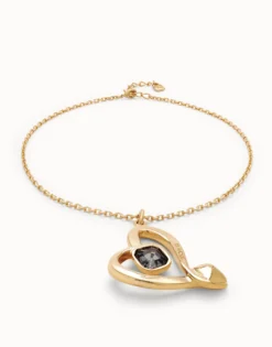 Colgante mediano bañado en oro de 18k y corazón con cristal negro