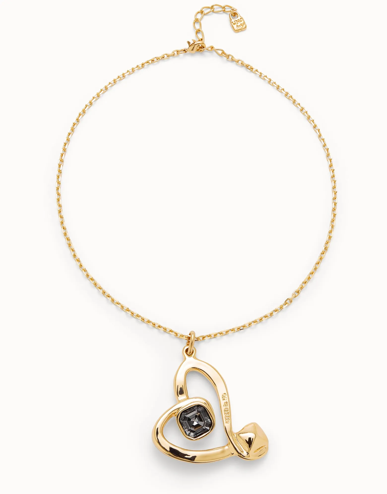 Colgante mediano bañado en oro de 18k y corazón con cristal negro