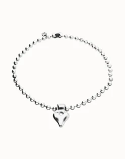 Collar con bolas bañado en plata de ley y detalle de corazón