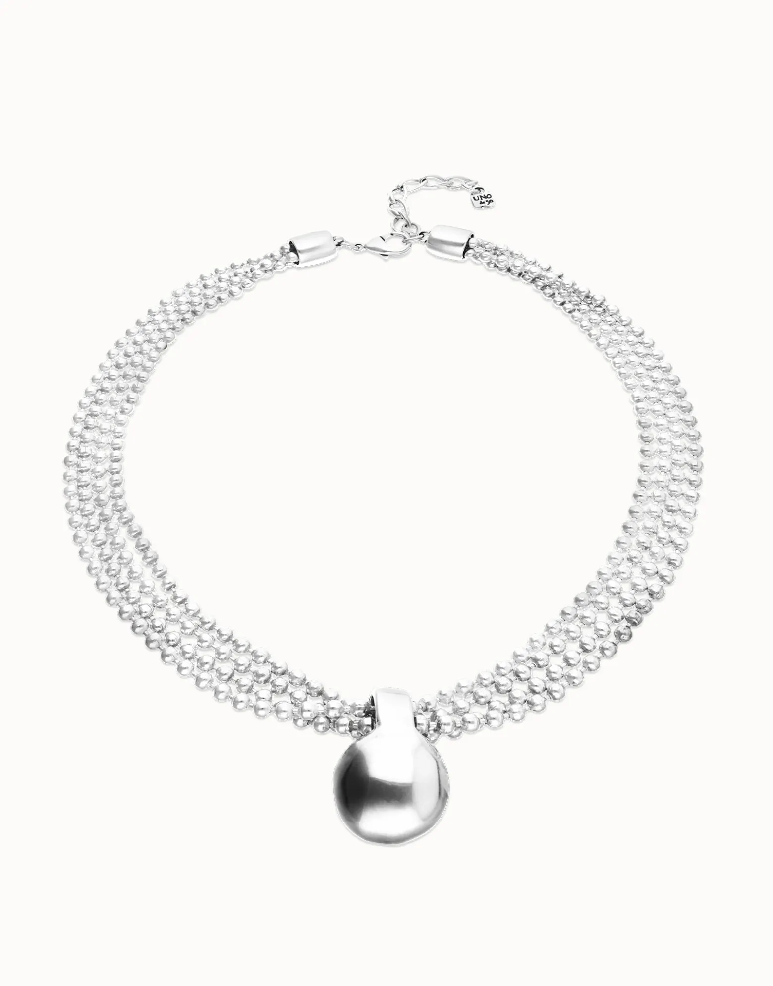 Collar con hilos plateados y esfera grande
