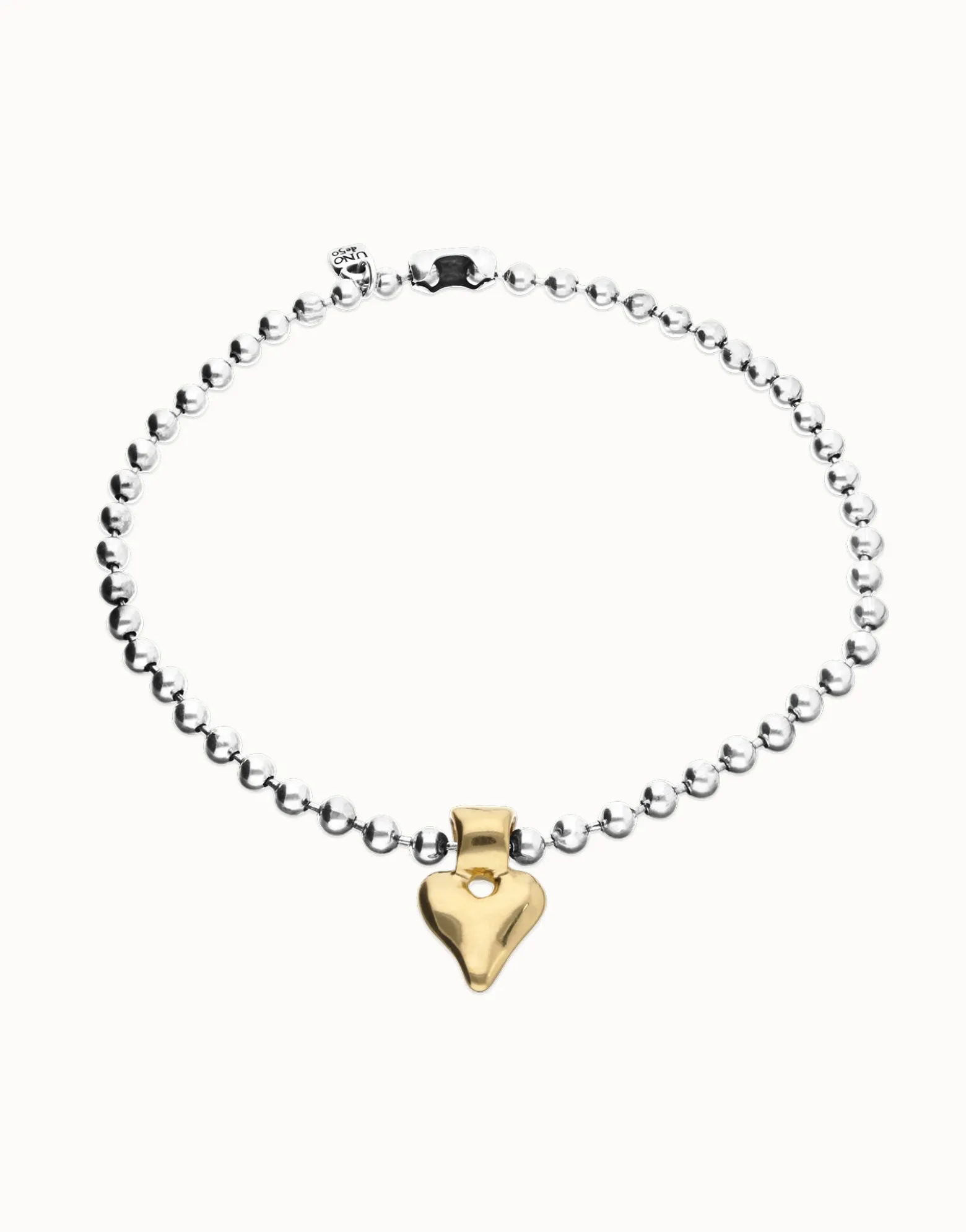 Collar de bolas bañada en plata con detalle de corazón en oro 18k