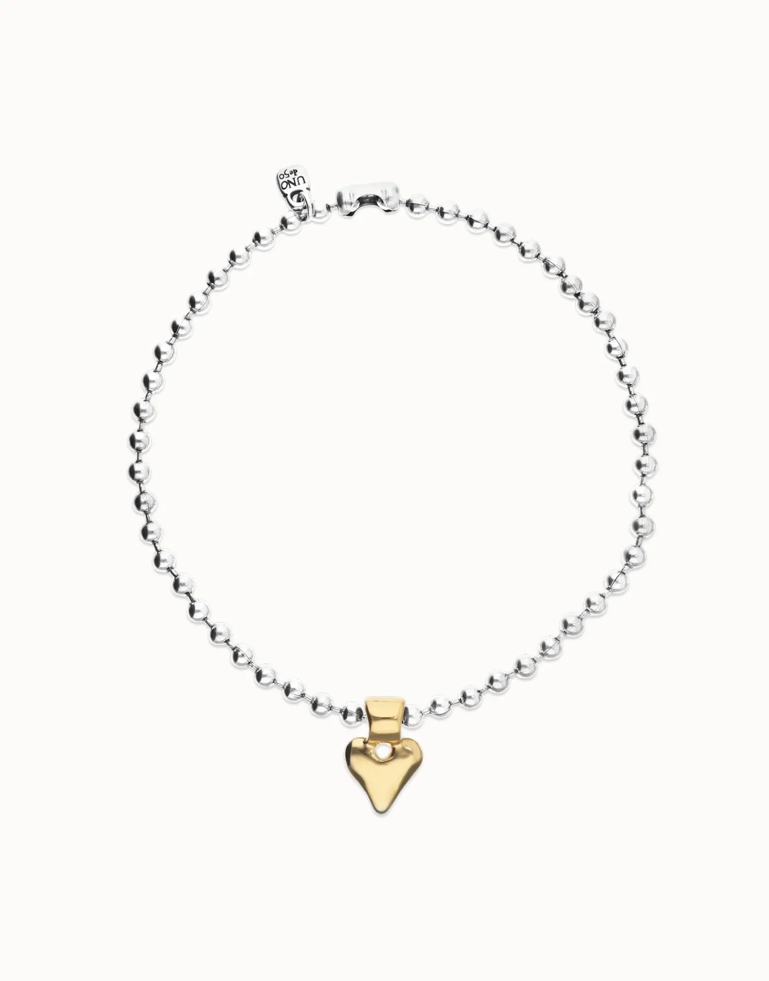 Collar de bolas bañada en plata con detalle de corazón en oro 18k