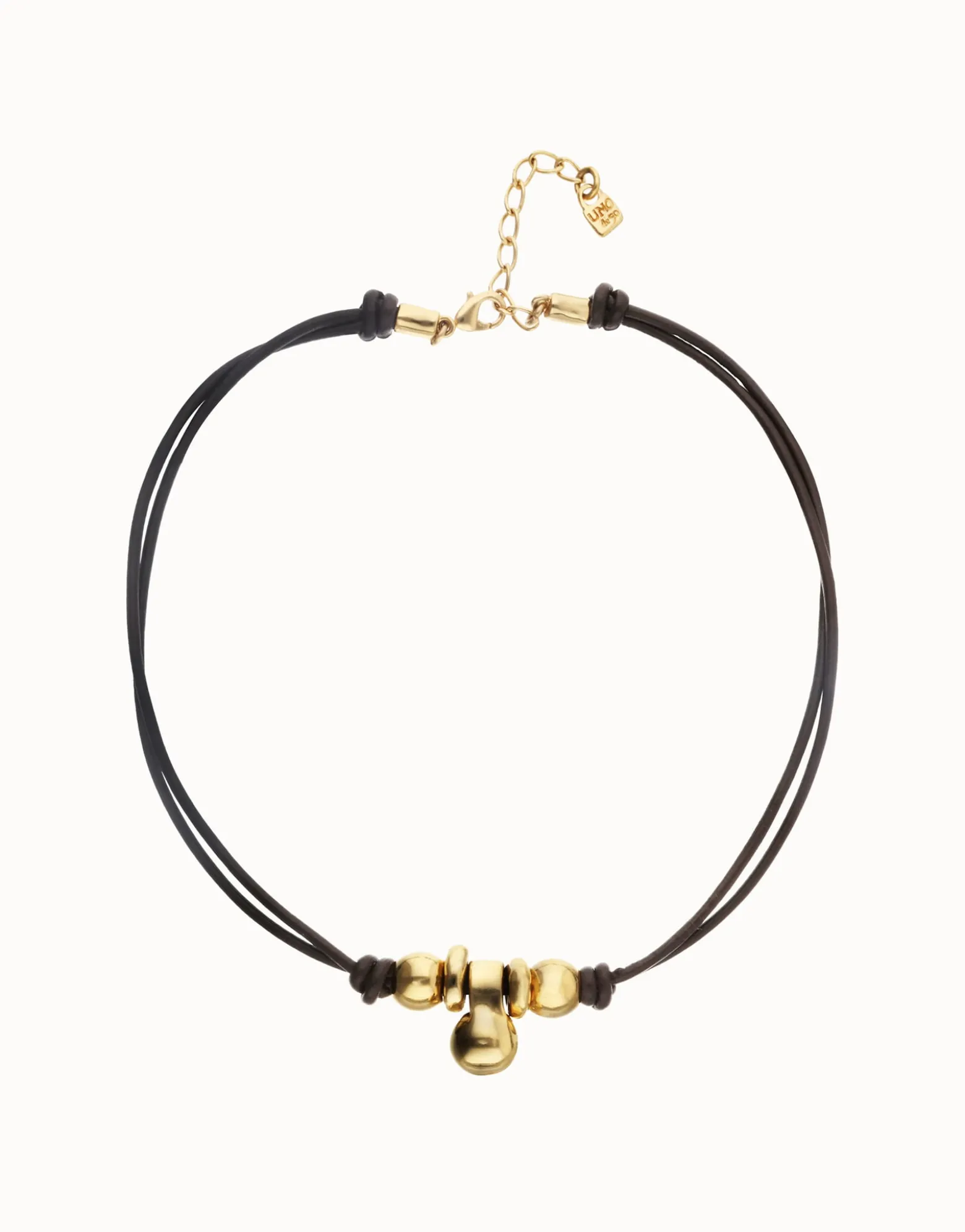 Collar de cuero con tres esferas bañadas en oro 18k