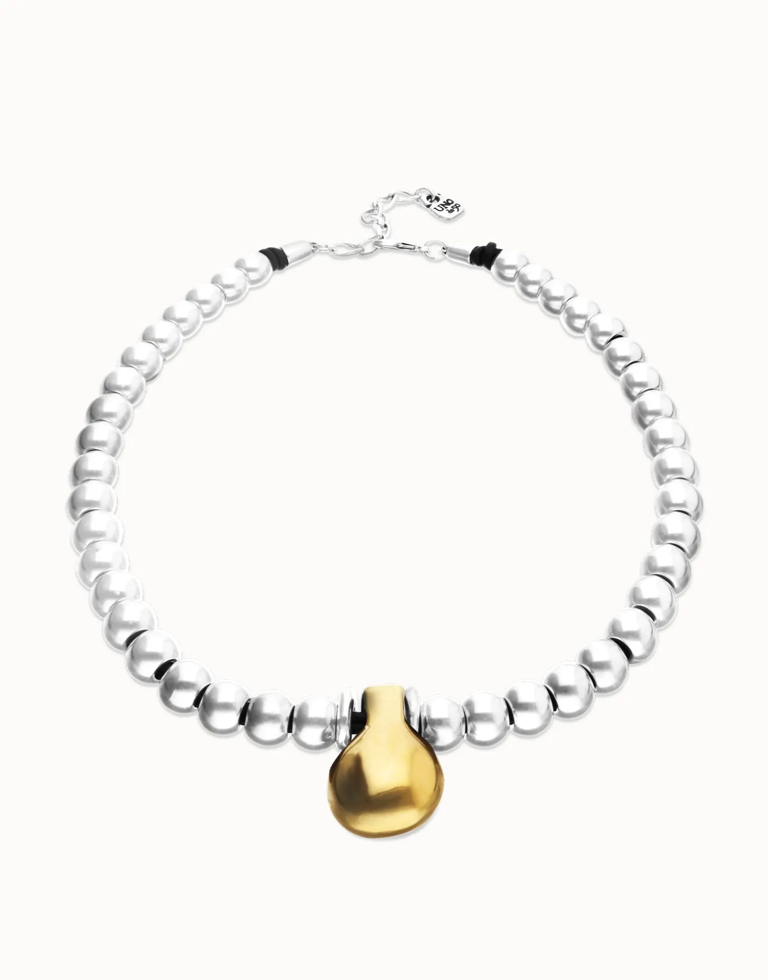 Collar de esferas medianas bañadas en plata de ley y esfera grande en oro 18k