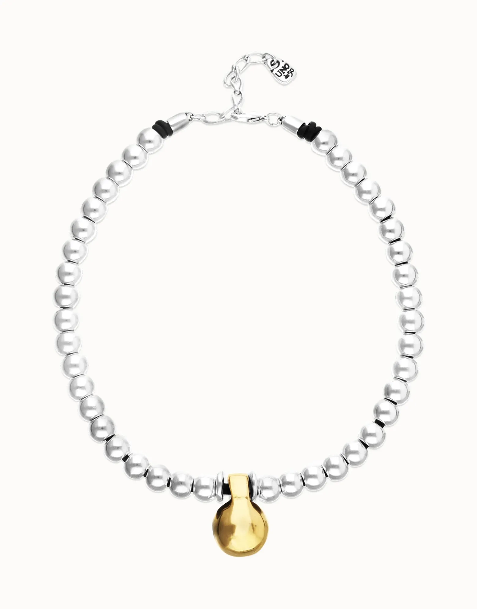 Collar de esferas medianas bañadas en plata de ley y esfera grande en oro 18k