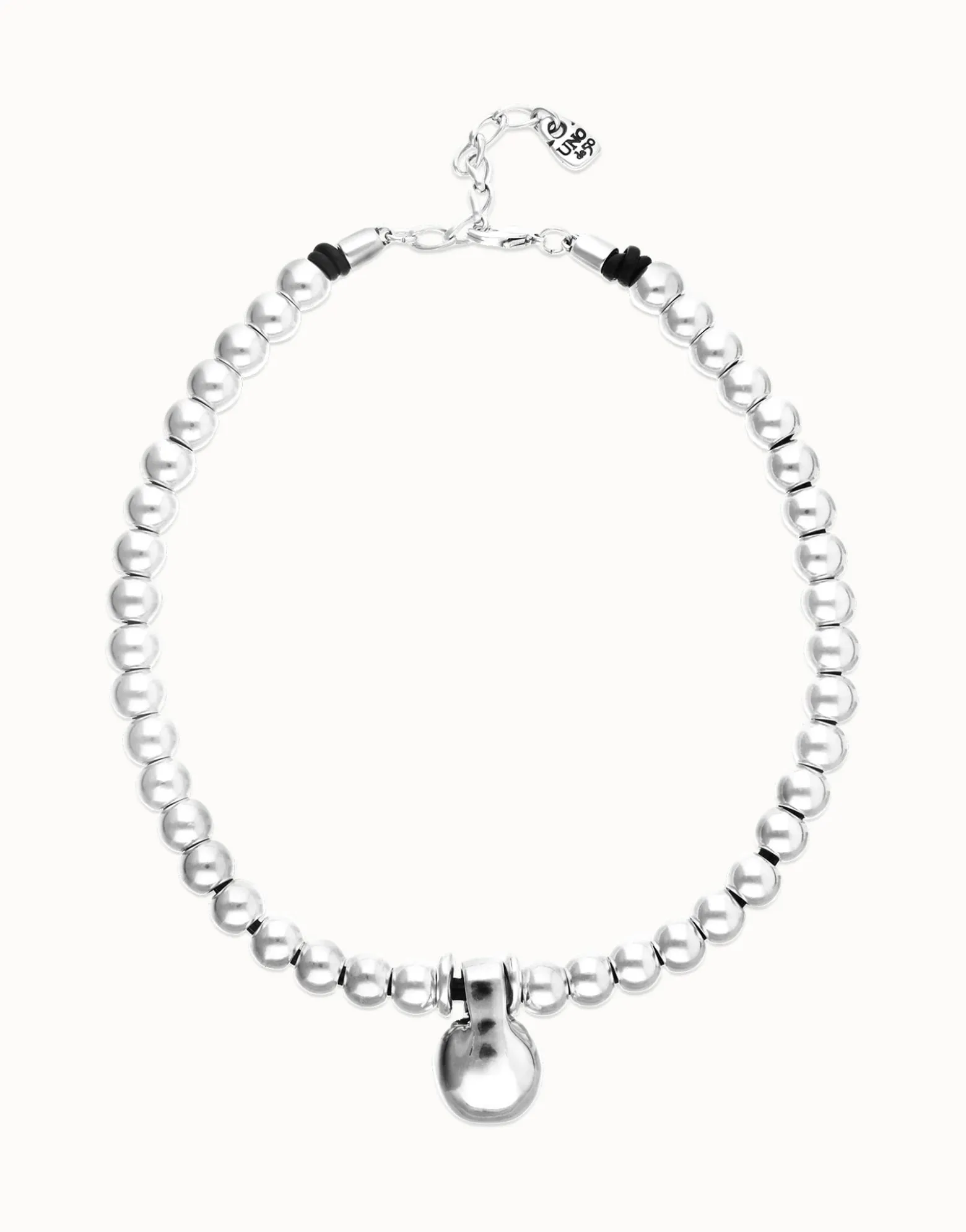 Collar de esferas medianas bañadas en plata de ley y esfera grande