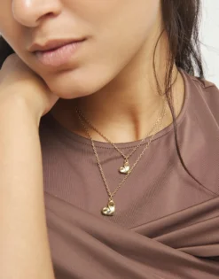Collar doble bañado en oro 18k con dos corazones
