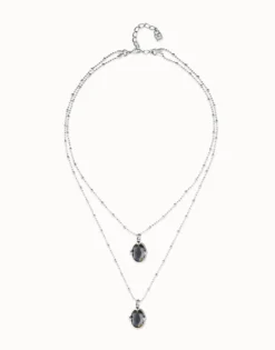 Collar doble bañado en plata con dos cristales facetados ovalados negros