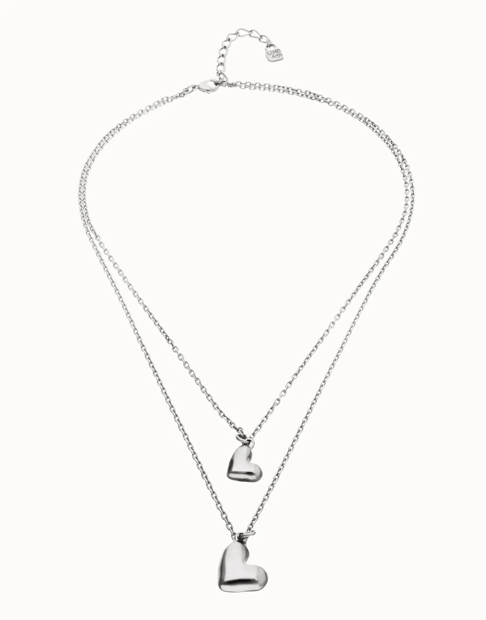 Collar doble bañado en plata de ley con dos corazones