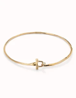 Collar rígido con cierre frontal bañado en oro 18k con topacio blanco