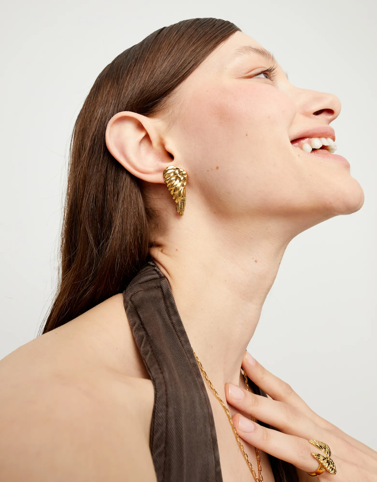 Pendientes bañados en oro 18k con forma de alas