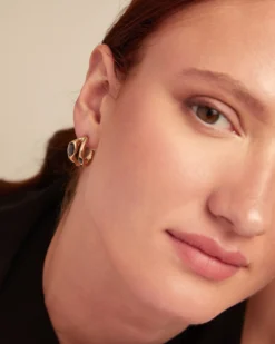 Pendientes bañados en oro 18k con cristal negro