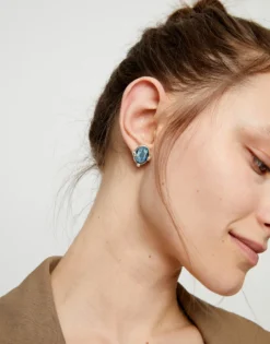 Pendientes bañados en plata con cristal facetado ovalado azul