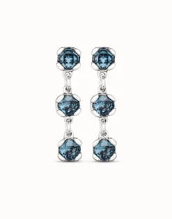 Pendientes bañados en plata de ley con cristales azules