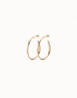 Pendientes de aro abierto bañados en oro de 18k