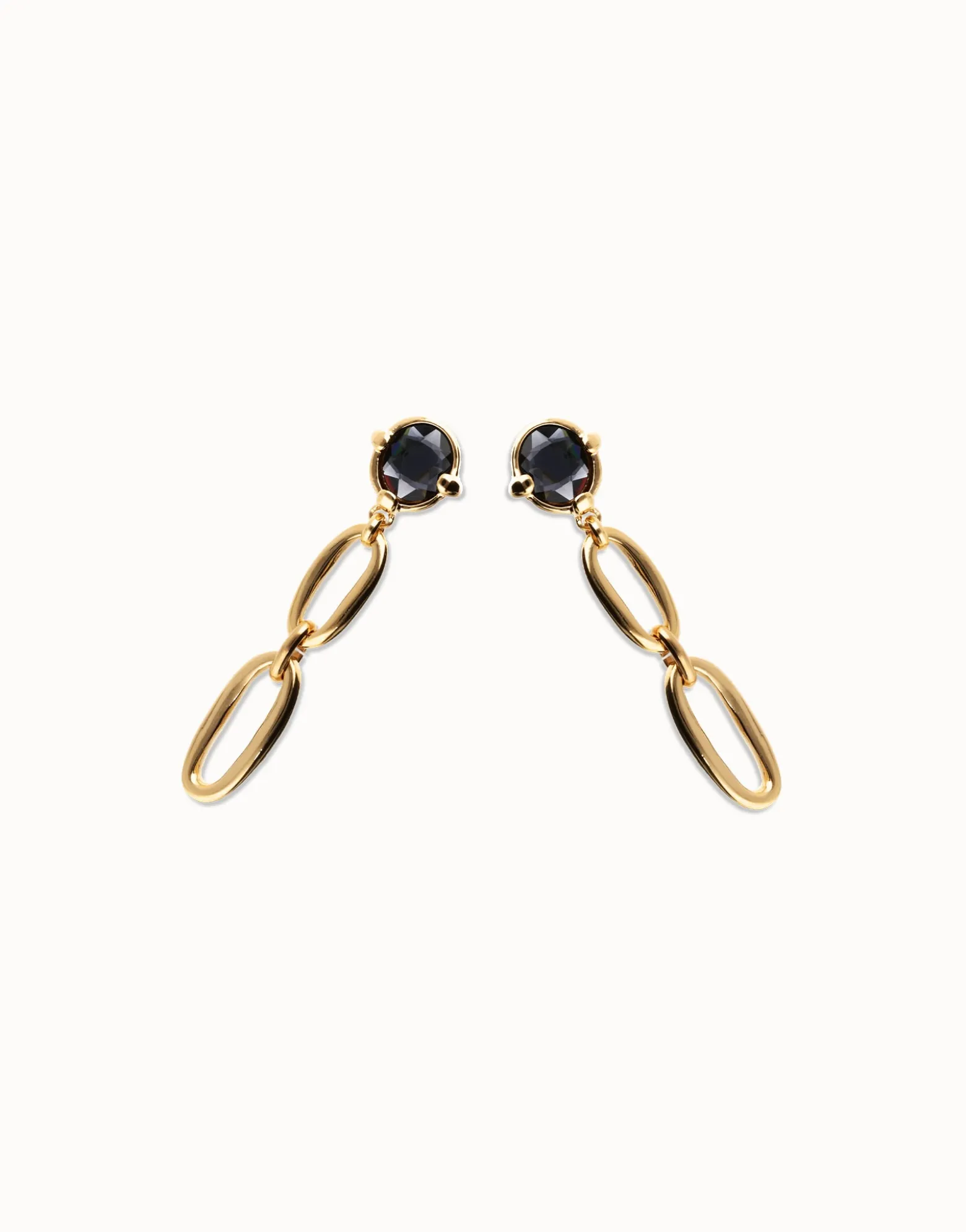 Pendientes largos bañados en oro 18k con cristal facetado negro y eslabones