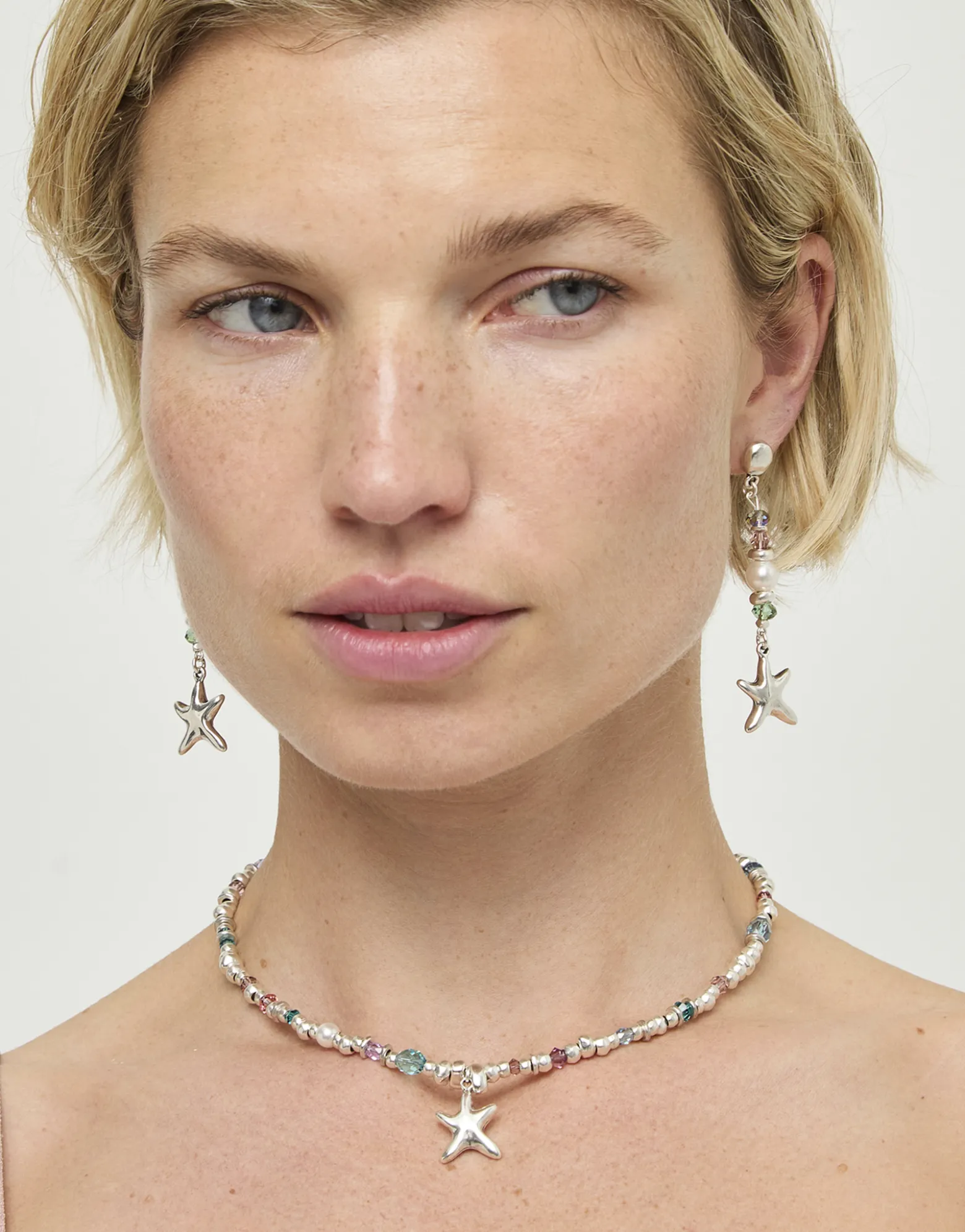 Pendientes largos con estrella de mar y perla