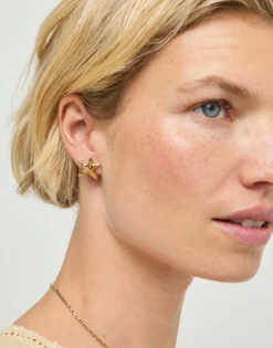 Pendientes pequeños bañado en oro estrellas de mar