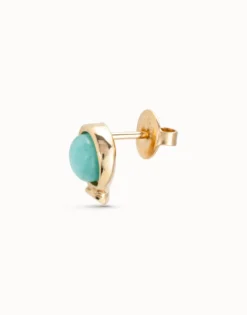 Piercing bañado en oro de 18k y un cristal azul