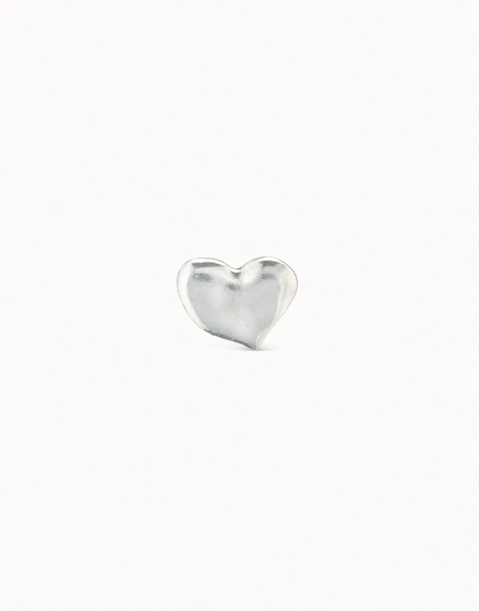 Piercing bañado en plata de ley de corazón