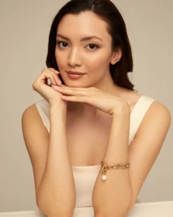 Pulsera bañada en oro 18k con eslabones y charm de perla