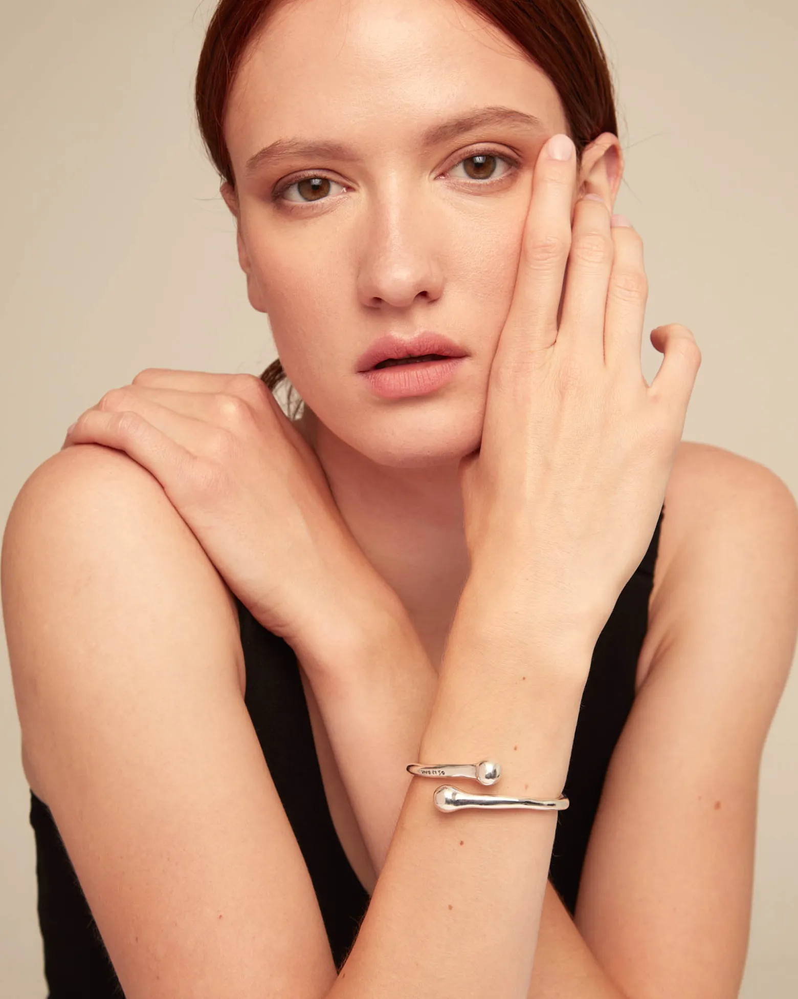 Pulsera bañada en plata con muelle interior