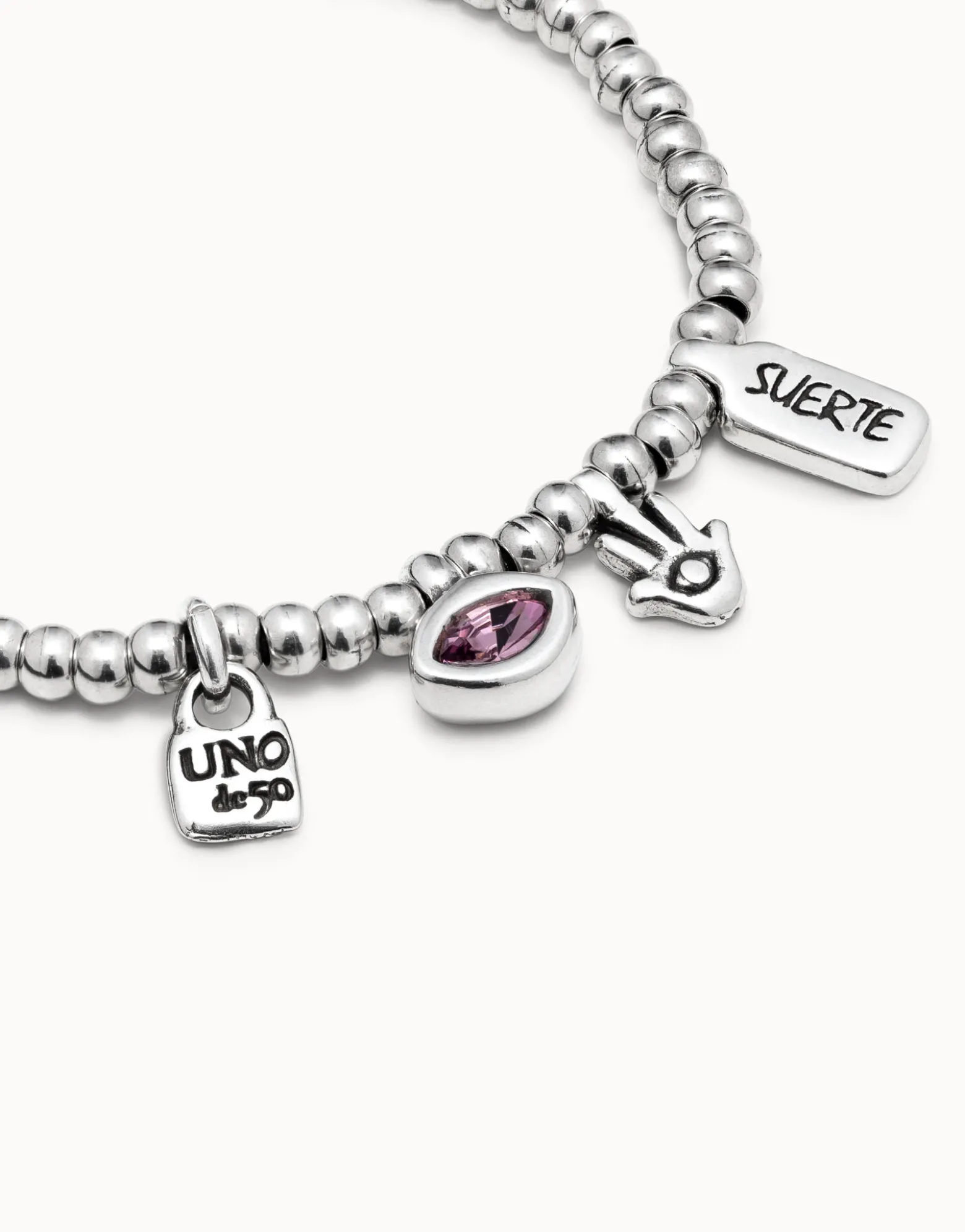 Pulsera bañada en plata de ley con charms