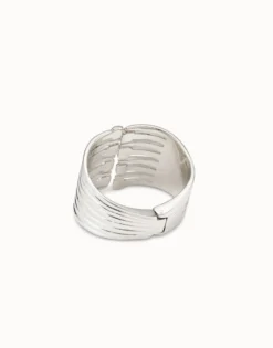 Pulsera bañada en plata de ley con múltiples cabezas de clavo