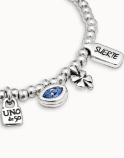 Pulsera bañada en plata de ley y cristal .
