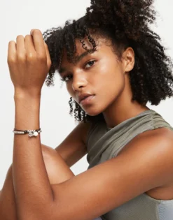 Pulsera bañadas en plata de ley con cuero y cristal de murano marfil