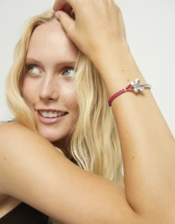 Pulsera combinada en cuero rosa y plata de ley con adorno de mariposa