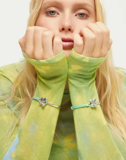 Pulsera combinada en cuero turquesa y plata de ley con adorno de mariposa