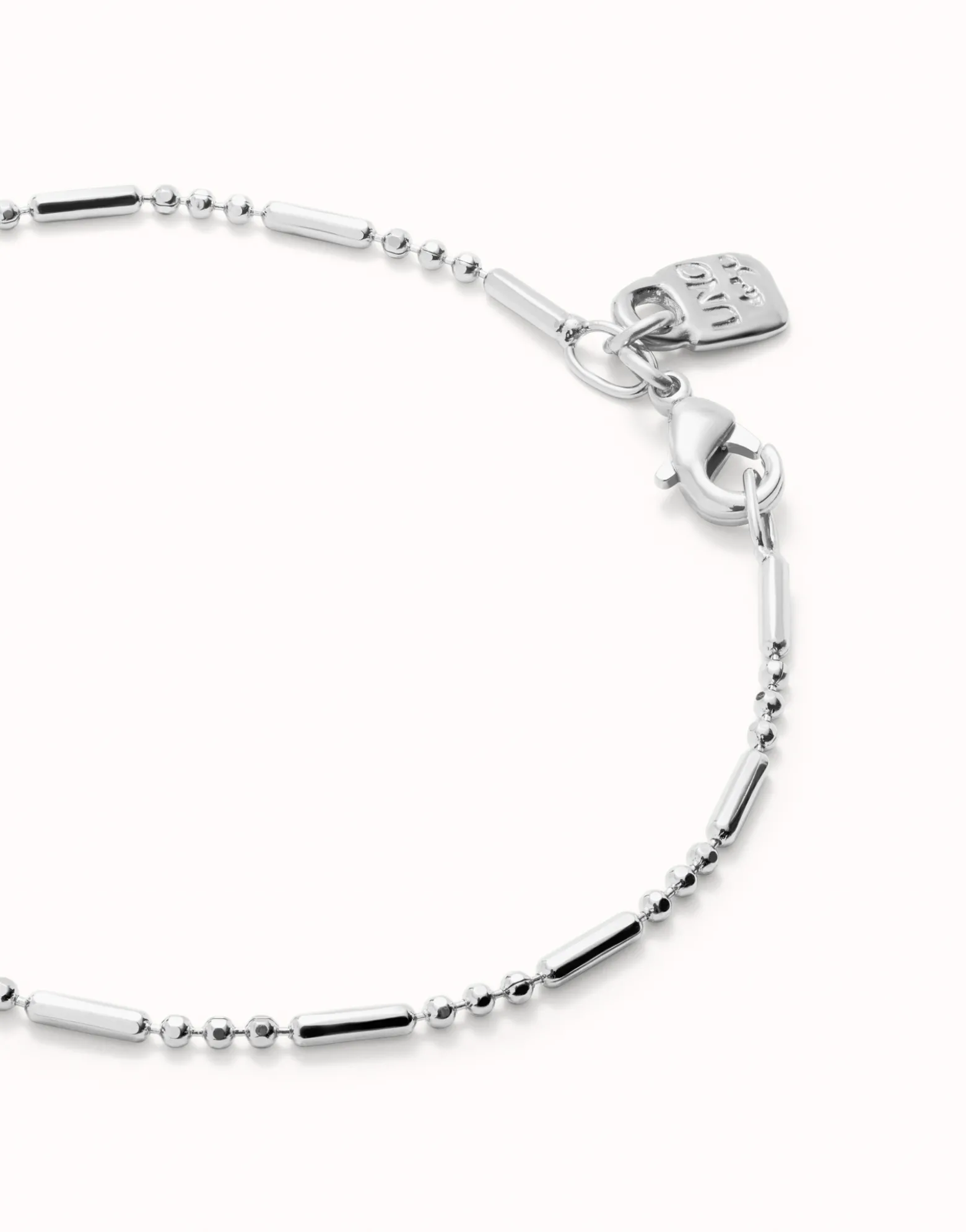 Pulsera con bolas y piezas alargadas bañada en plata de ley
